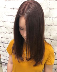 Hair color cherry cola red on 20 year old woman