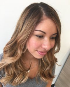Layers- woman with long balayage layers