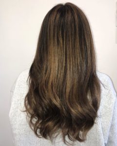 Single Process haircolor highlights on virgin brunette hair